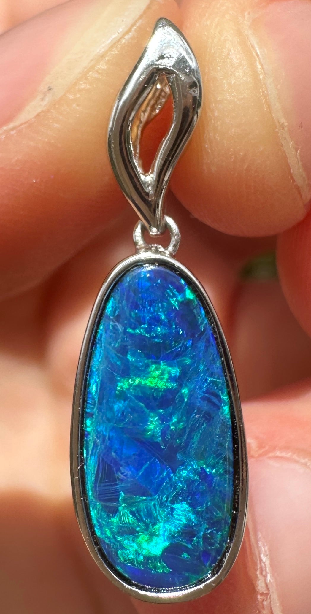 Australian muliticolored opal doublet drop pendant set in sterling silver 6.935 cts