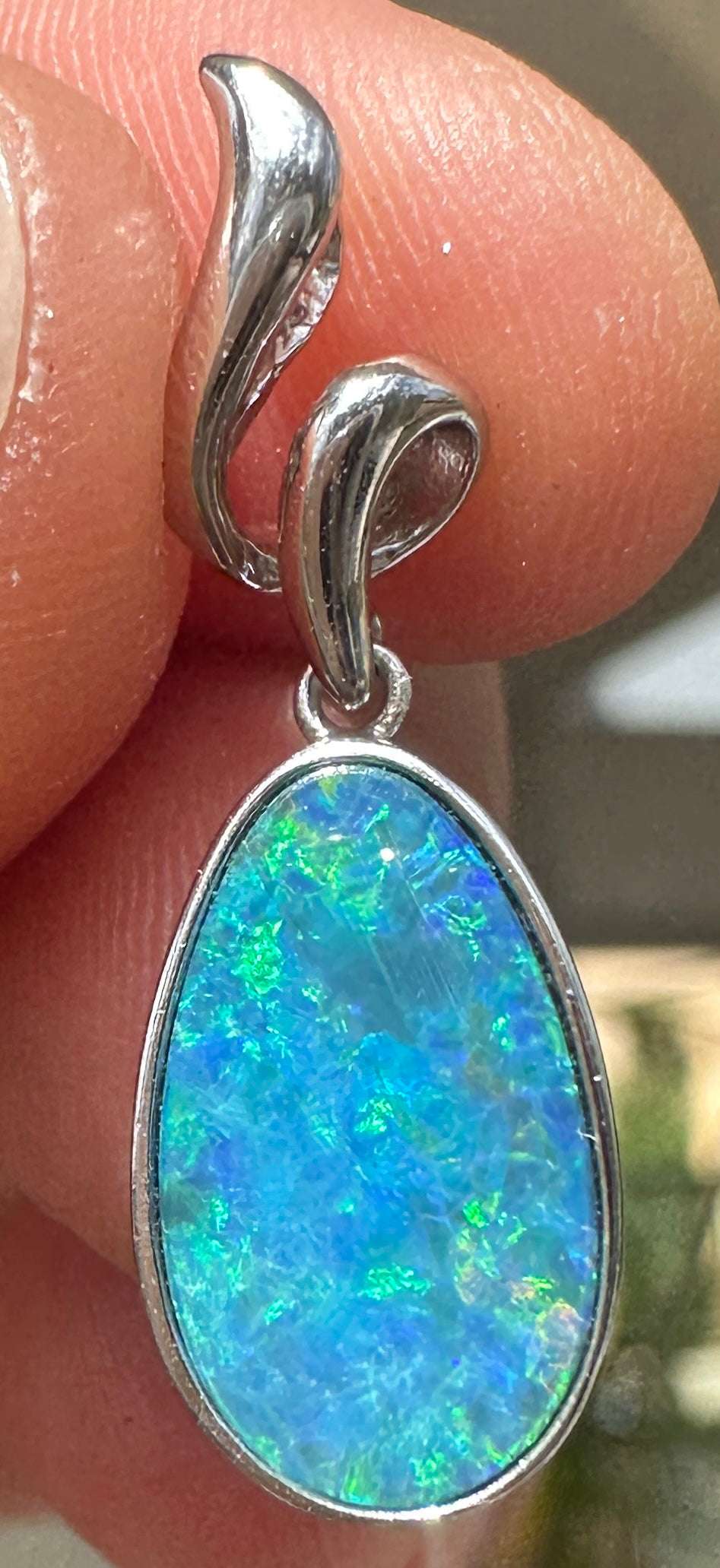 Australian muliticolored opal doublet drop pendant set in sterling silver 7.065 cts