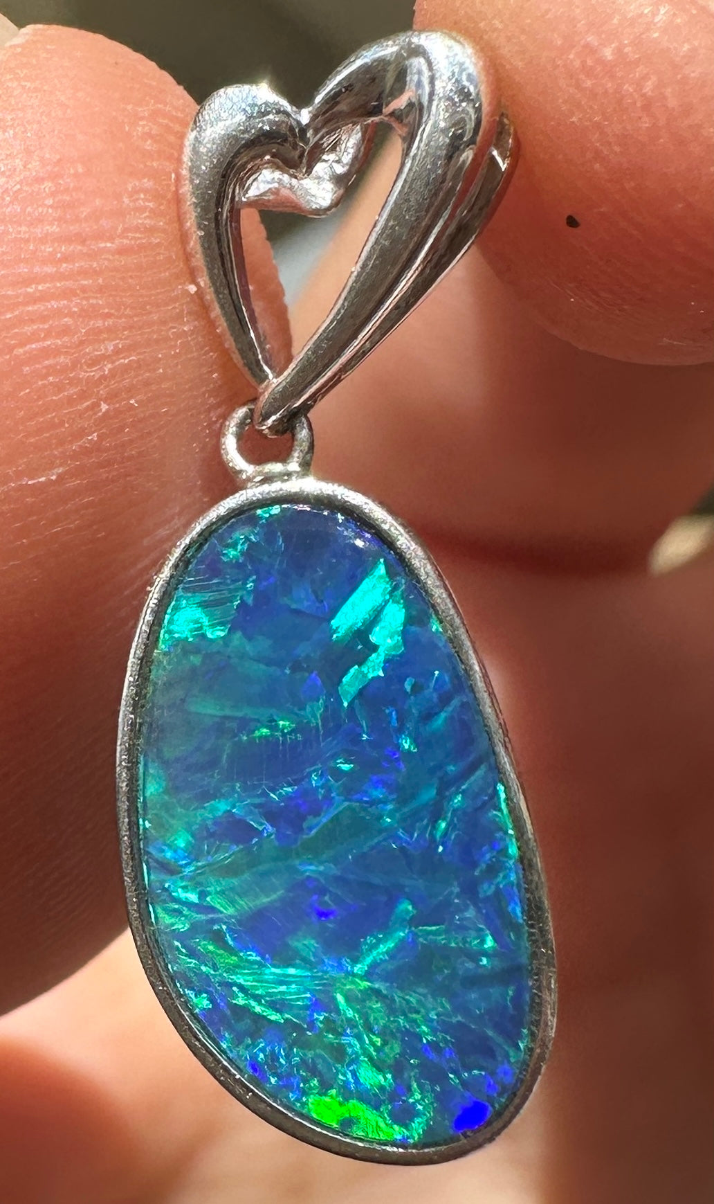 Australian muliticolored opal doublet drop pendant set in sterling silver 8.105 cts