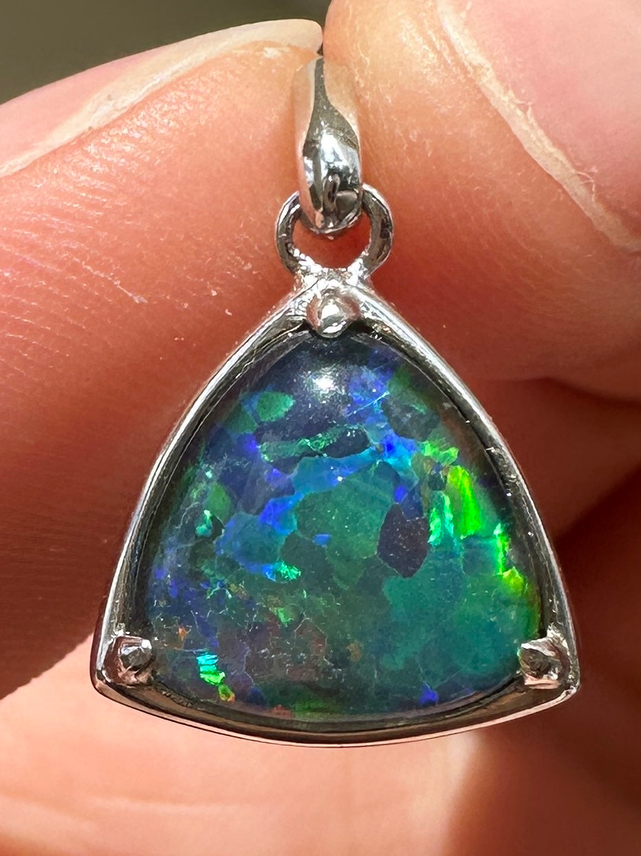 Australian muliticolored opal doublet drop pendant set in sterling silver and encrusted with cubic zirconia diamonds 6.62 cts