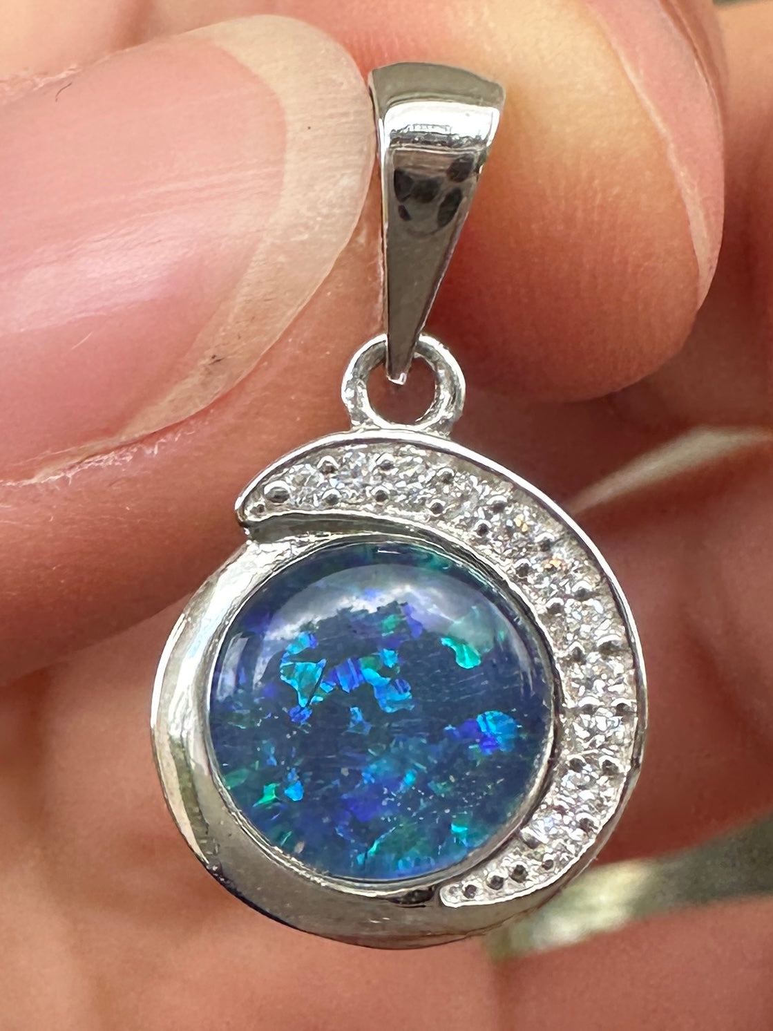 Australian muliticolored opal doublet drop pendant set in sterling silver and encrusted with cubic zirconia diamonds 7.215 cts