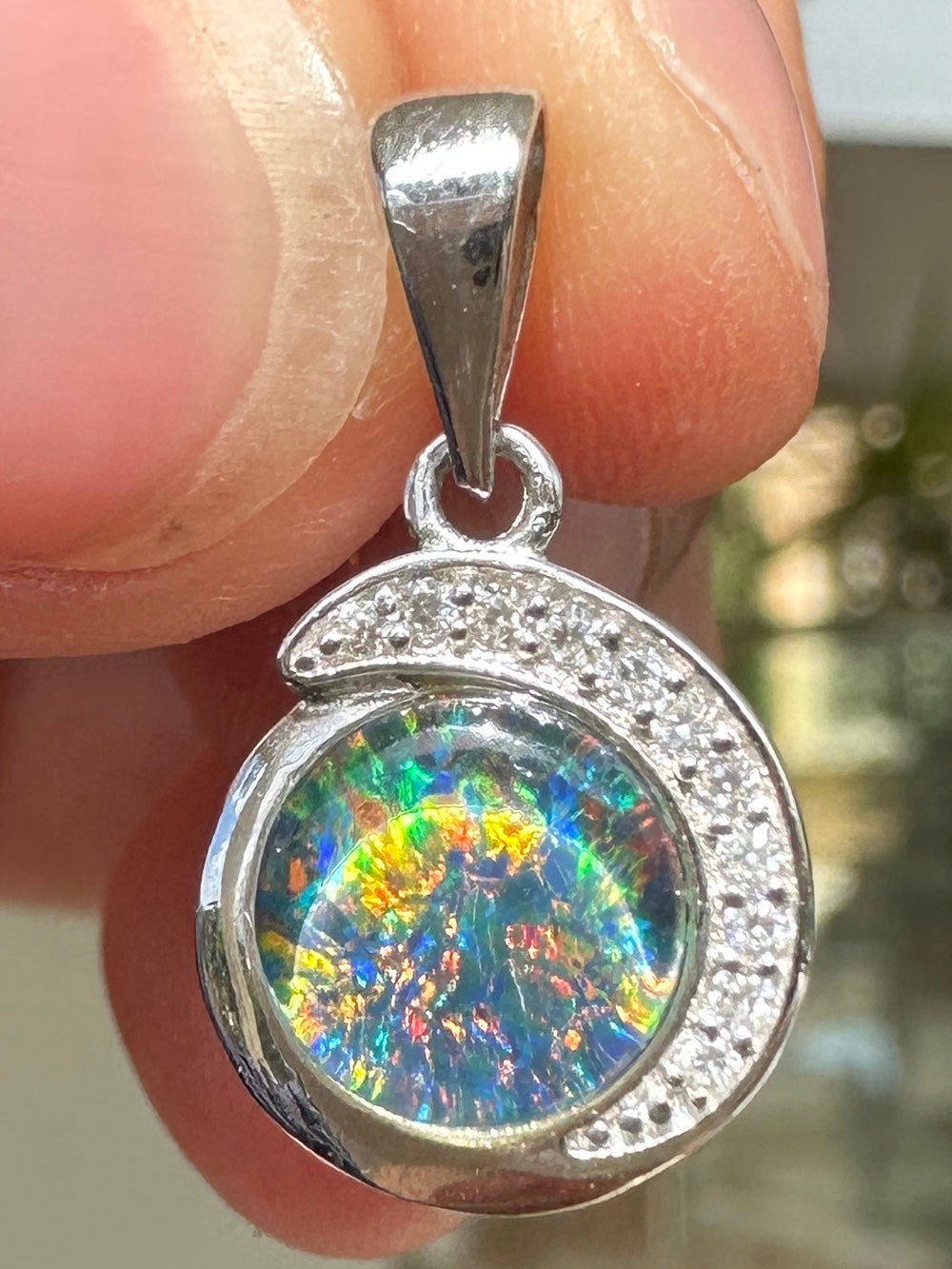 Australian muliticolored opal doublet drop pendant set in sterling silver and encrusted with cubic zirconia diamonds 6.965 cts