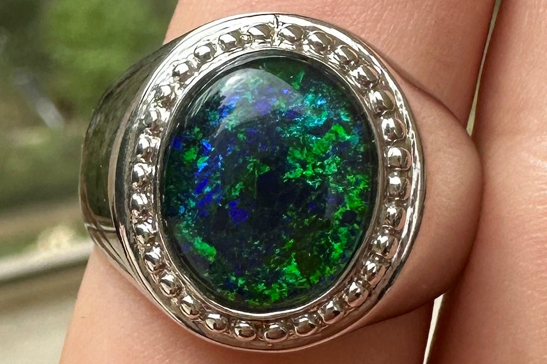 Australian muliticolored opal triplet ring set in sterling silver 33.105 cts
