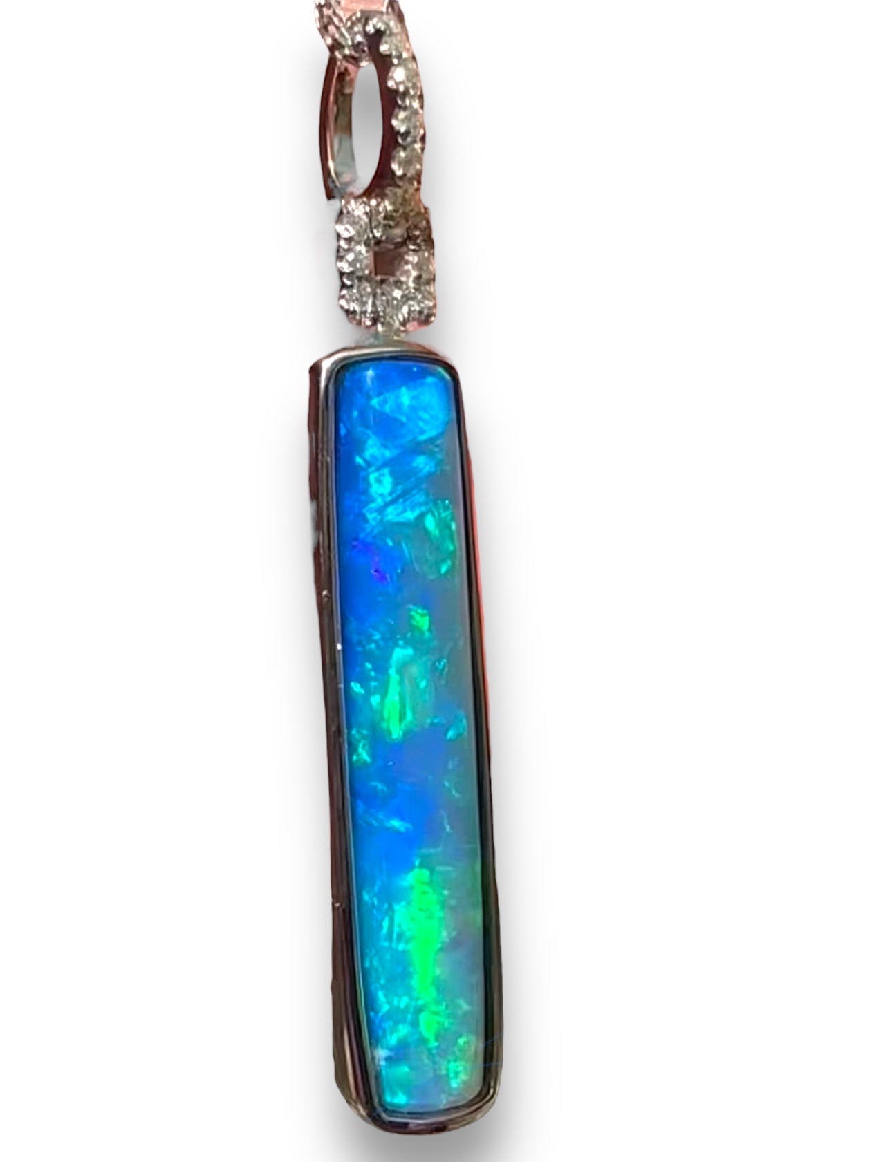 Exquisite opal Belemnite set in 18k gold and diamonds - Opal Essence Wholesalers