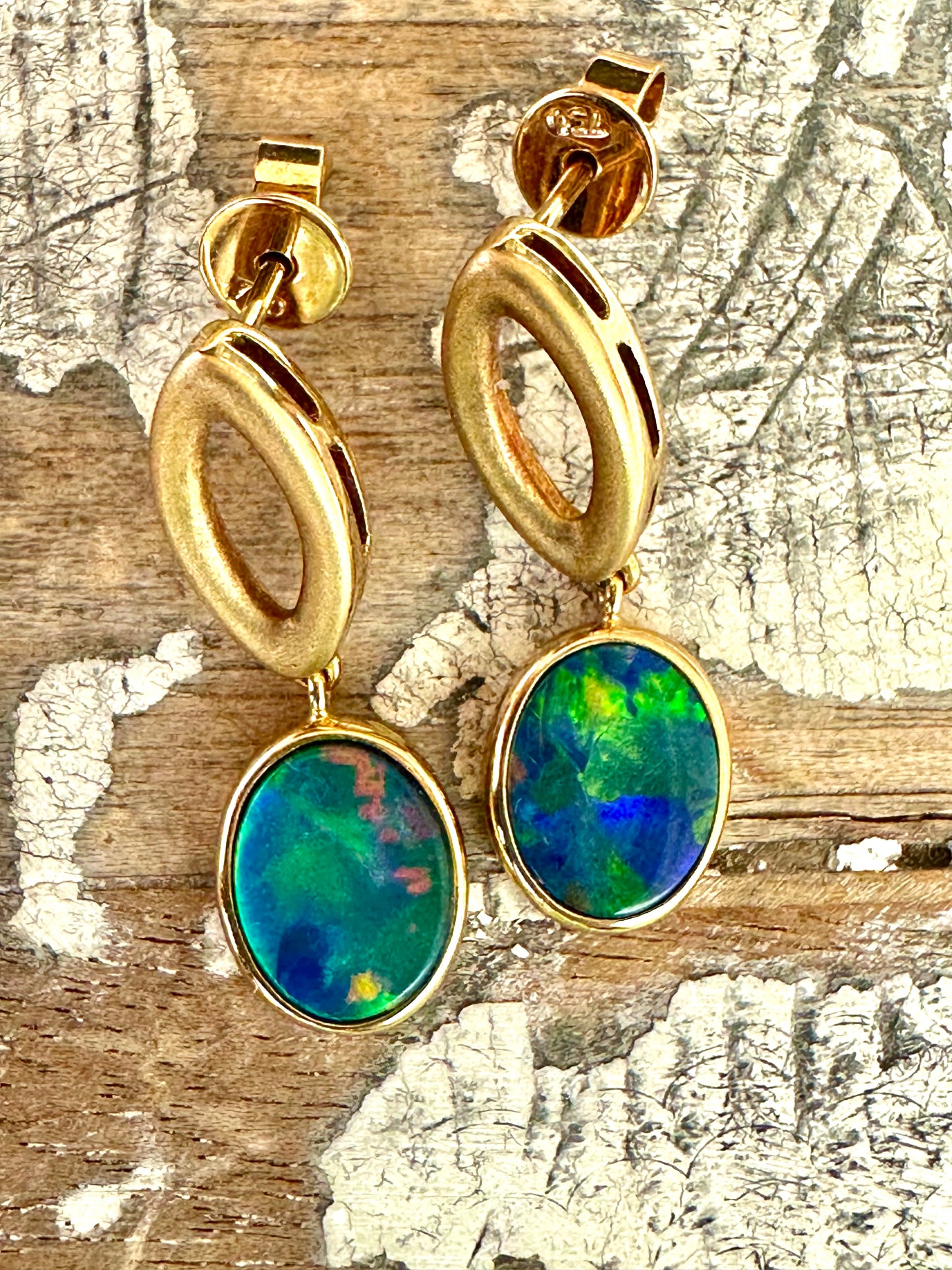  Opal Doublet earrings set in 18k yellow gold