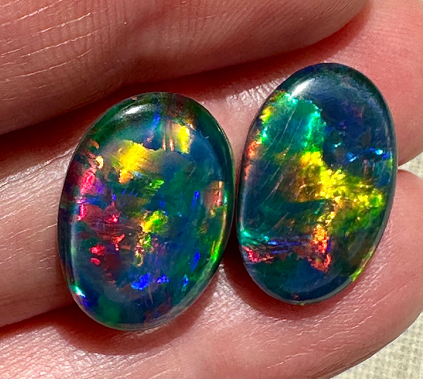 Matching gem grade 18x13mm Australian opal tripletsMatching gem grade 18x13mm Australian opal triplets