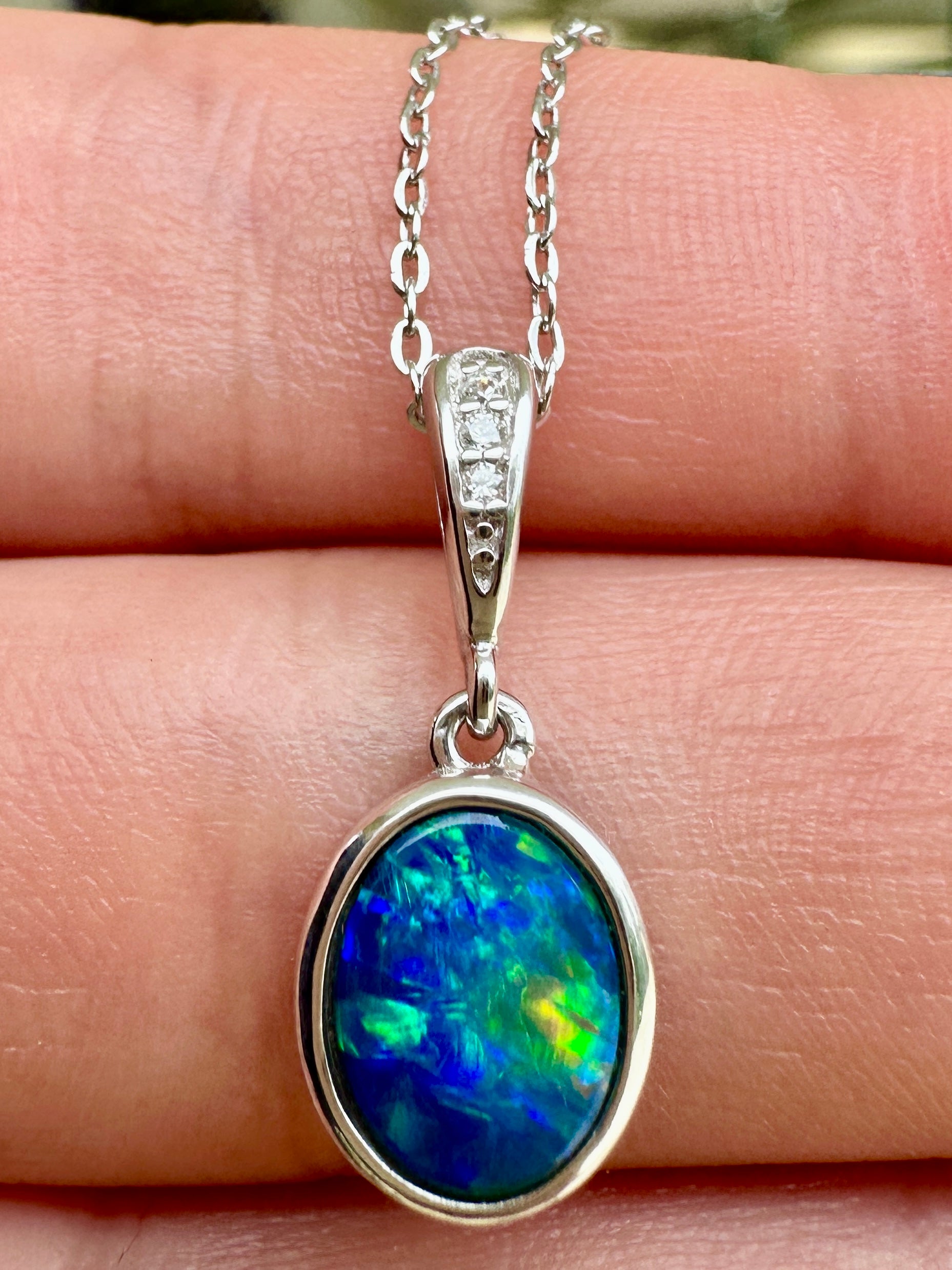 Coober Pedy drop pendant - Australian Opal set in sterling silver encrusted with cubic Zirconia diamonds in the bale 9.95 cts 