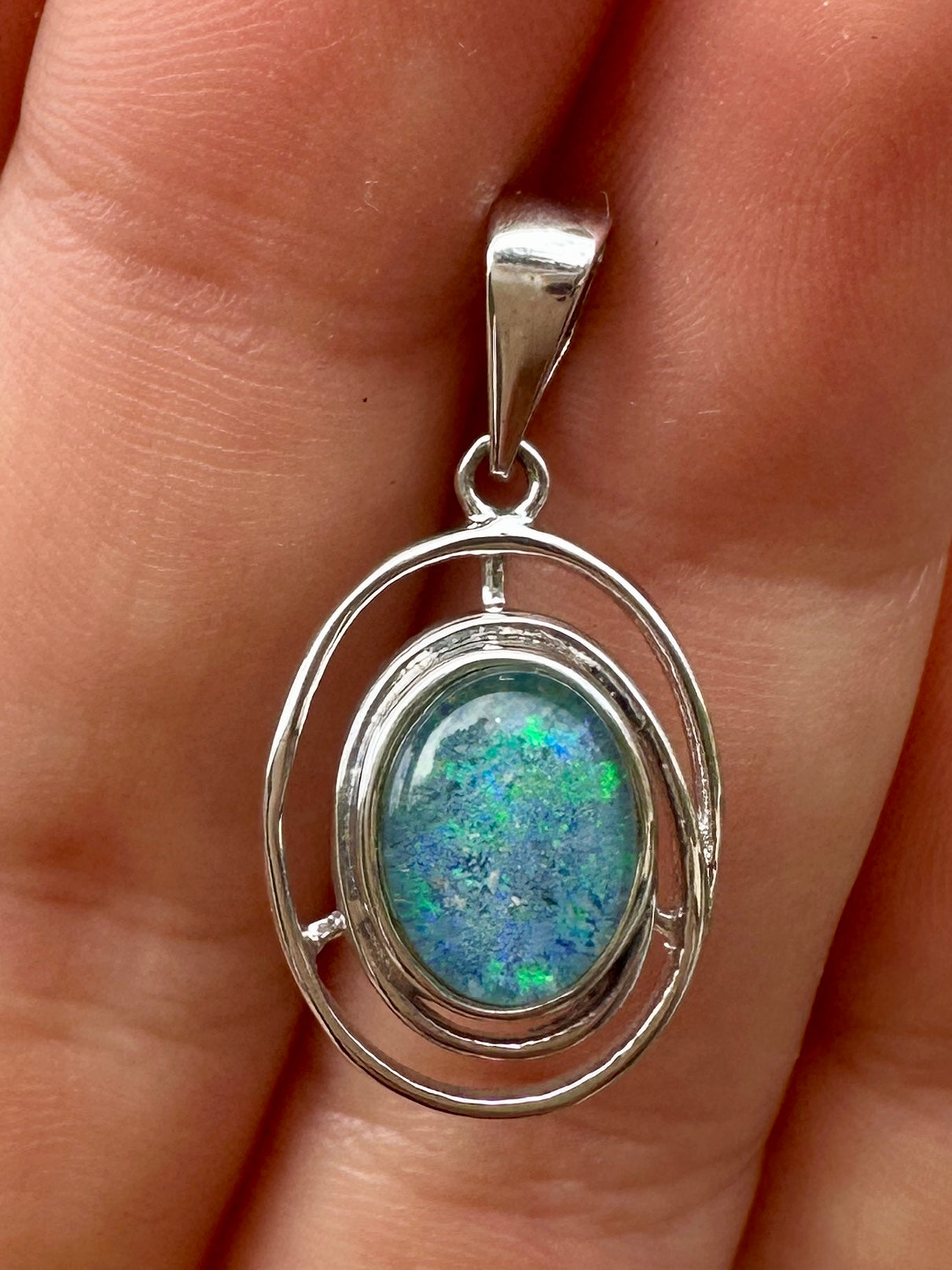 Australian muliticolored opal doublet drop pendant set in sterling silver and encrusted with cubic zirconia diamonds 7.27 cts
