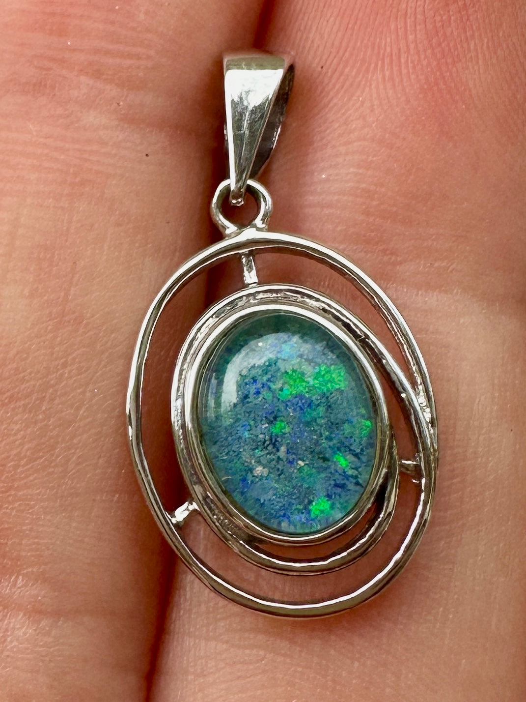 Australian muliticolored opal doublet drop pendant set in sterling silver and encrusted with cubic zirconia diamonds 7.27 cts