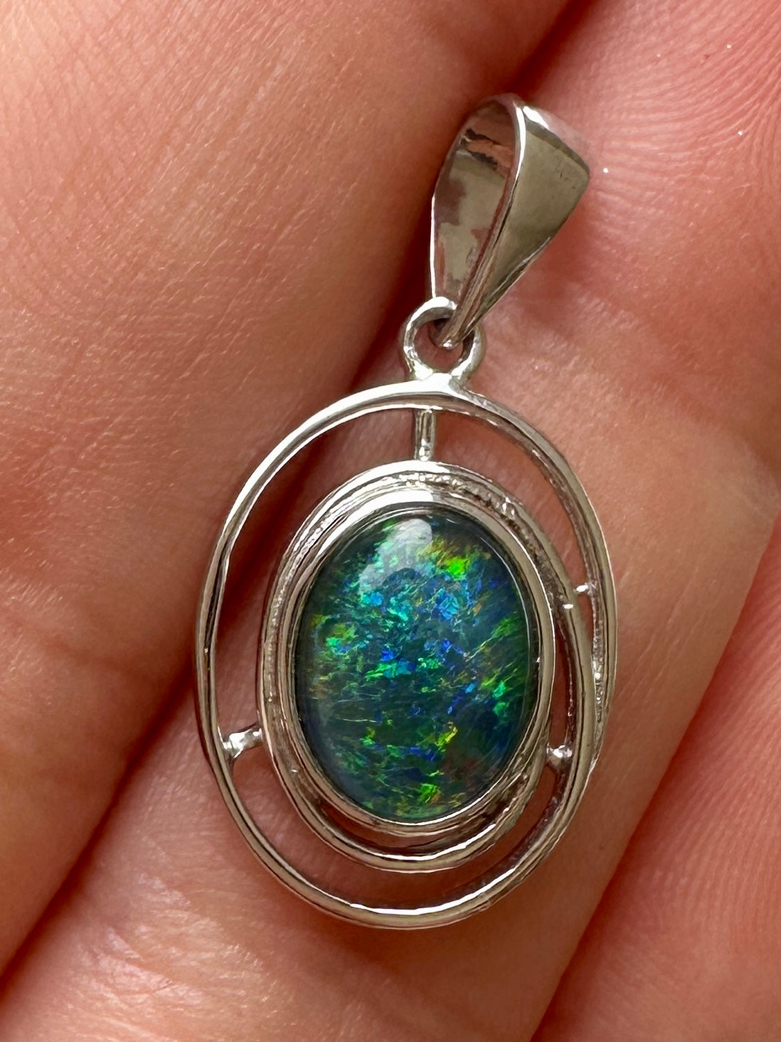 Australian muliticolored opal doublet drop pendant set in sterling silver and encrusted with cubic zirconia diamonds 7.585 cts