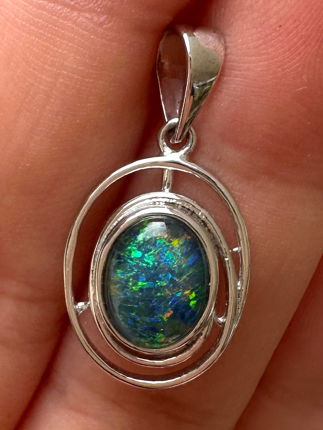 Australian muliticolored opal doublet drop pendant set in sterling silver and encrusted with cubic zirconia diamonds 7.585 cts