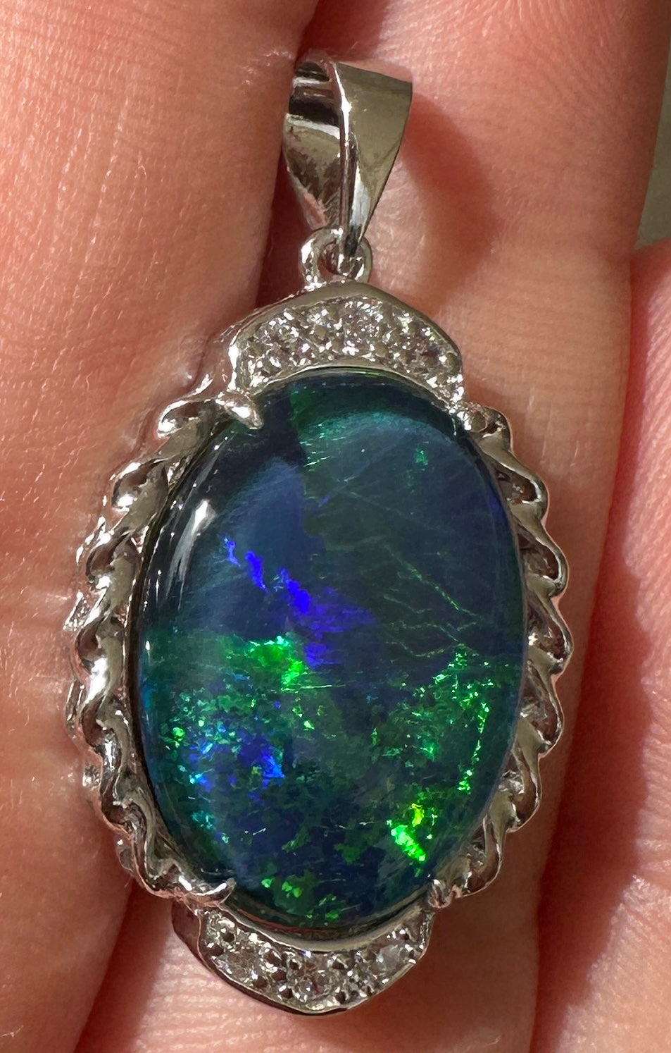 Australian muliticolored opal doublet drop pendant set in sterling silver and encrusted with cubic zirconia diamonds 17.48 cts