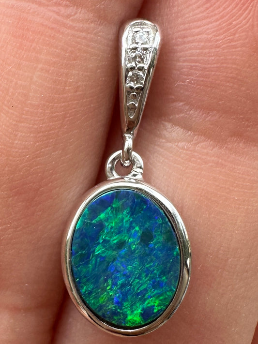 Australian muliticolored opal doublet drop pendant set in sterling silver and encrusted with cubic zirconia diamonds 5.835 cts