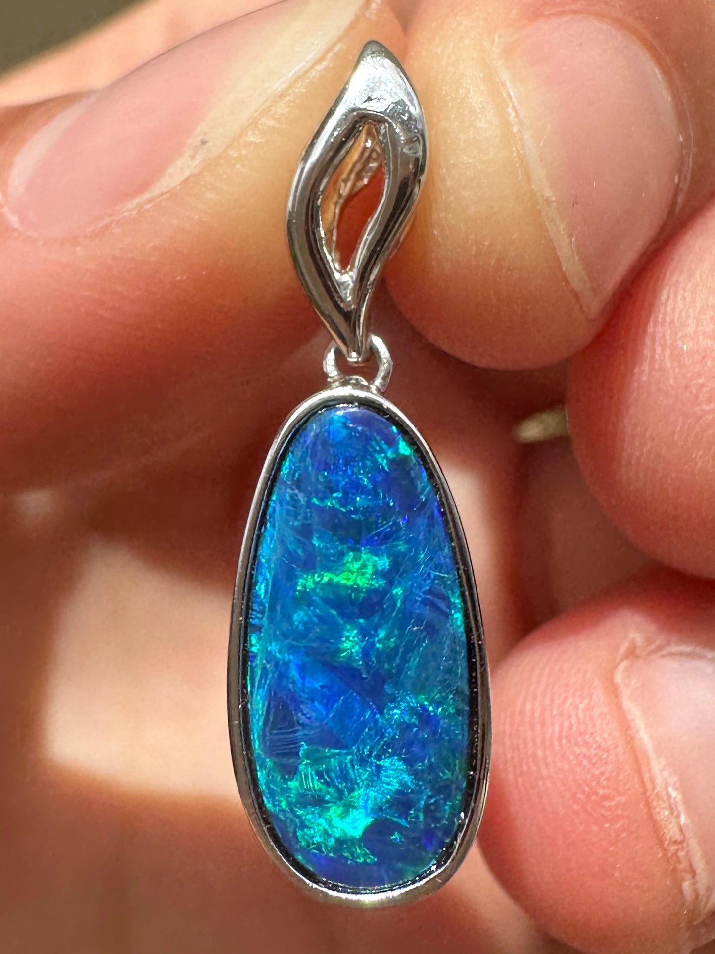 Australian muliticolored opal doublet drop pendant set in sterling silver 6.935 cts