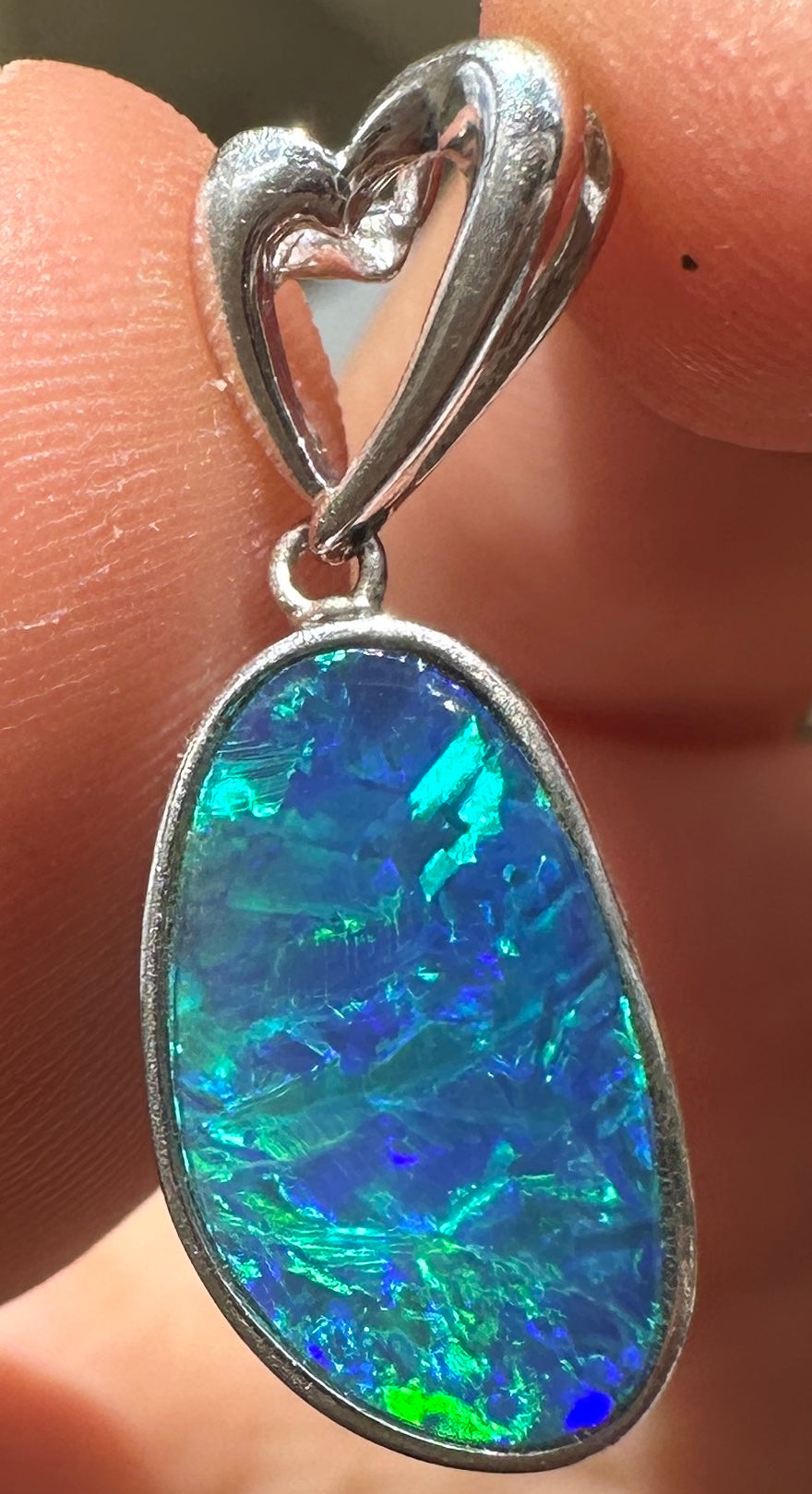 Australian muliticolored opal doublet drop pendant set in sterling silver 8.105 cts