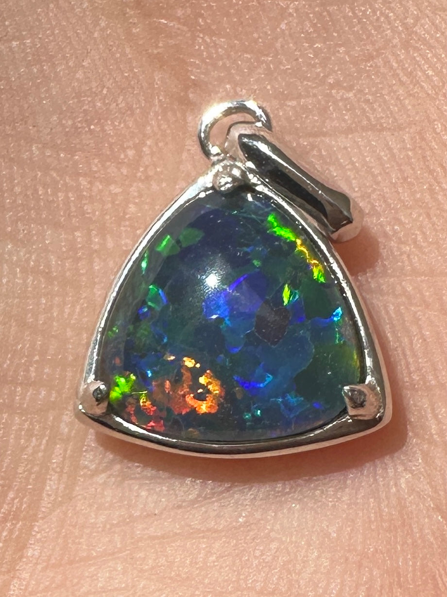 Australian muliticolored opal doublet drop pendant set in sterling silver and encrusted with cubic zirconia diamonds 6.62 cts