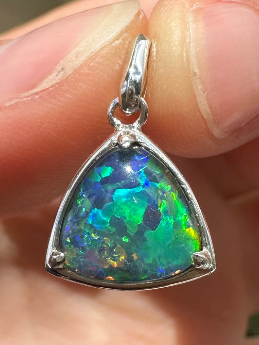Australian muliticolored opal doublet drop pendant set in sterling silver and encrusted with cubic zirconia diamonds 6.62 cts
