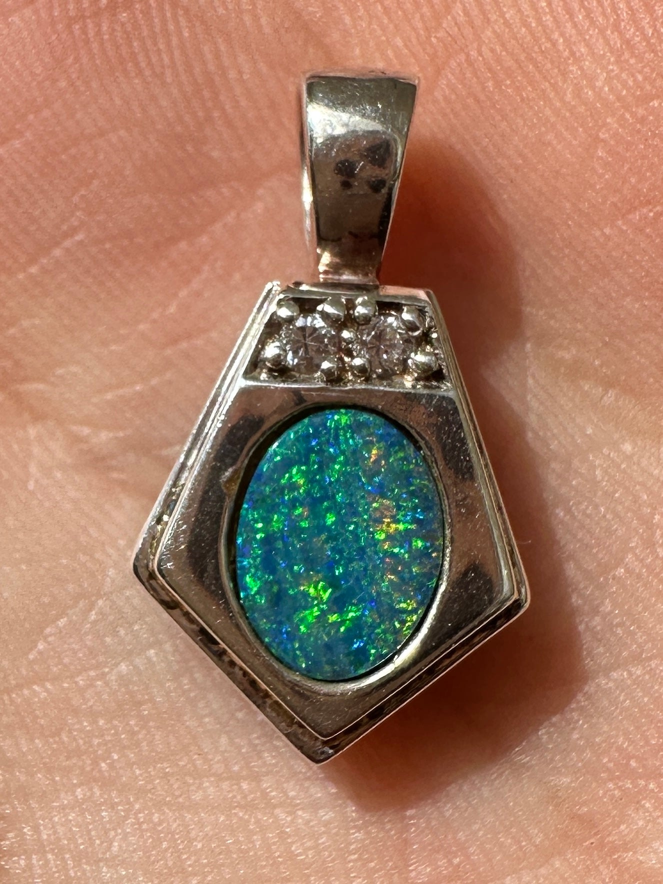 Australian muliticolored opal doublet drop pendant set in sterling silver and encrusted with cubic zirconia diamonds 12.545 cts