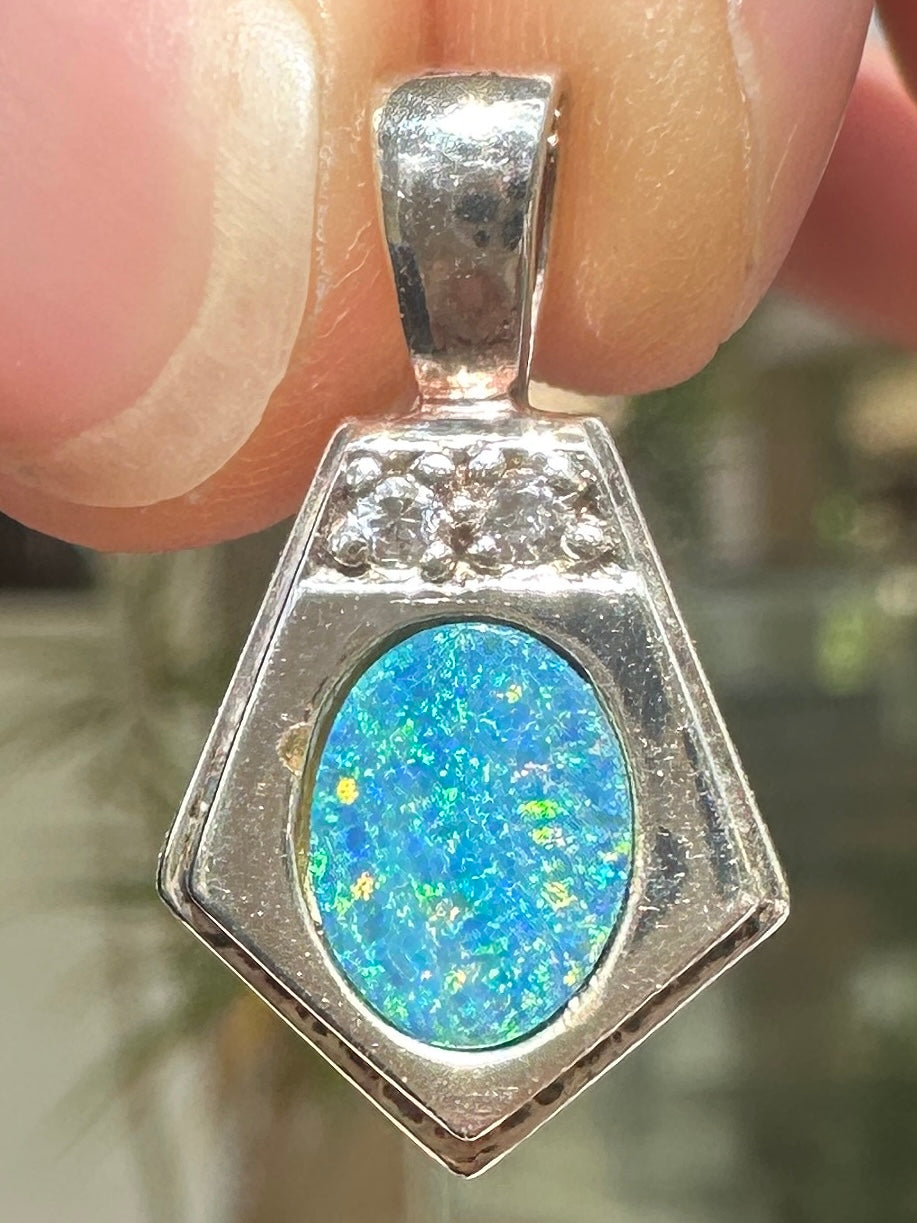 Australian muliticolored opal doublet drop pendant set in sterling silver and encrusted with cubic zirconia diamonds 12.545 cts
