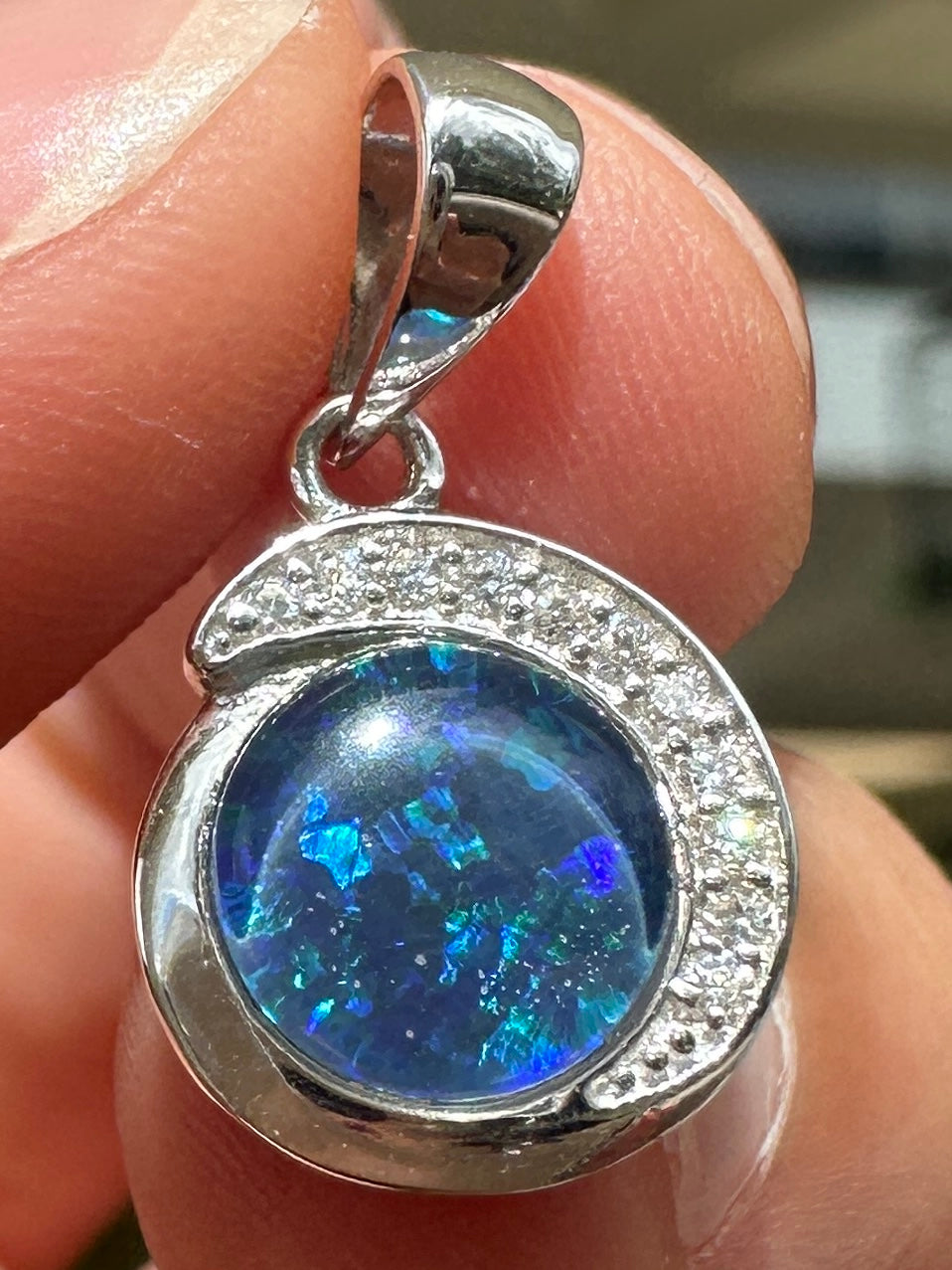Australian muliticolored opal doublet drop pendant set in sterling silver and encrusted with cubic zirconia diamonds 7.215 cts