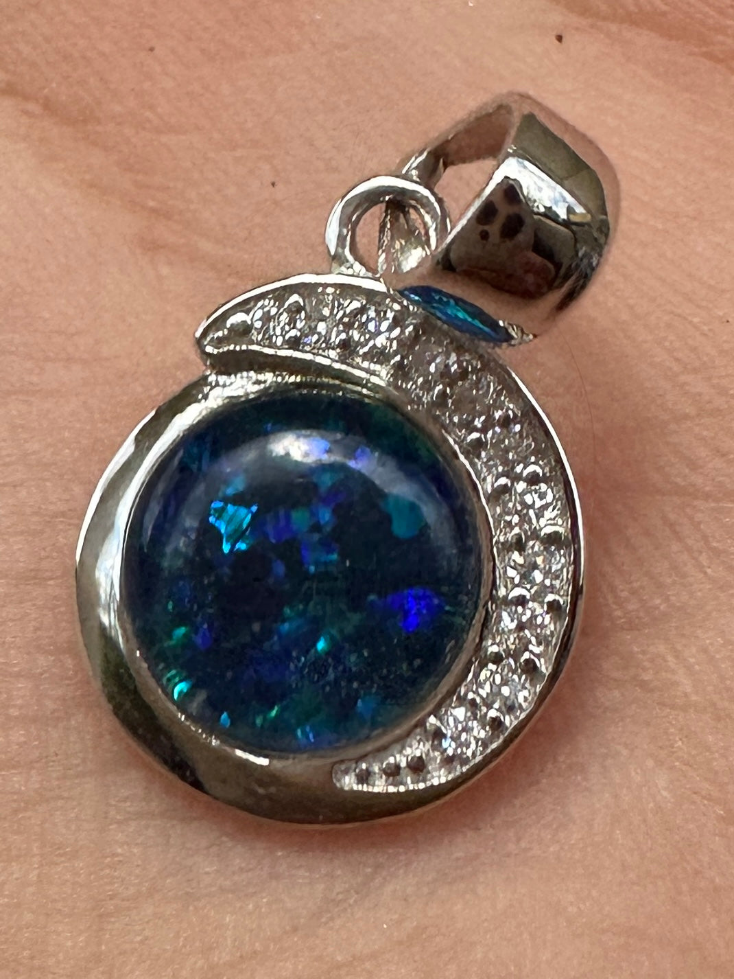Australian muliticolored opal doublet drop pendant set in sterling silver and encrusted with cubic zirconia diamonds 7.215 cts