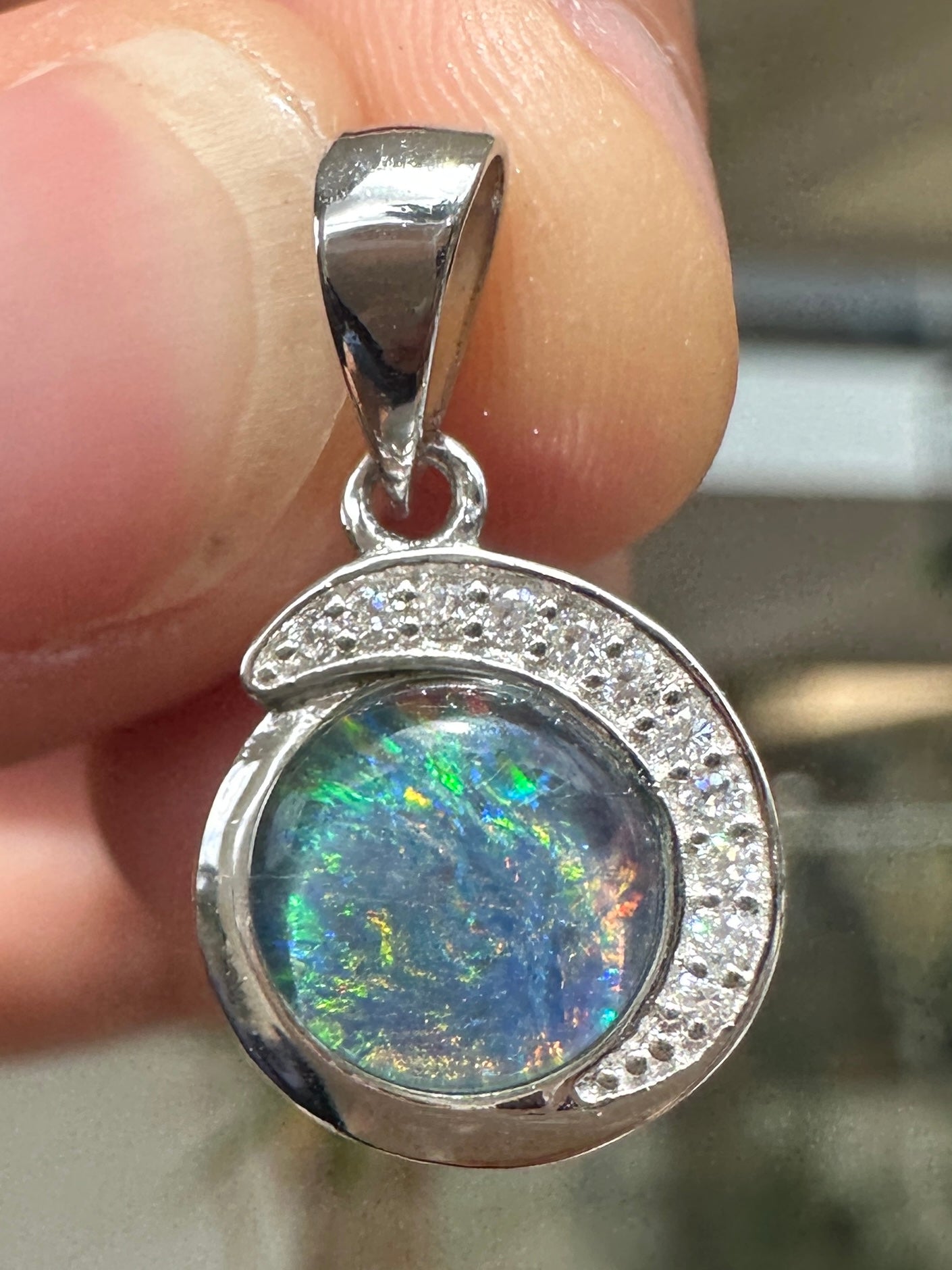 Australian muliticolored opal doublet drop pendant set in sterling silver and encrusted with cubic zirconia diamonds 7.30 cts