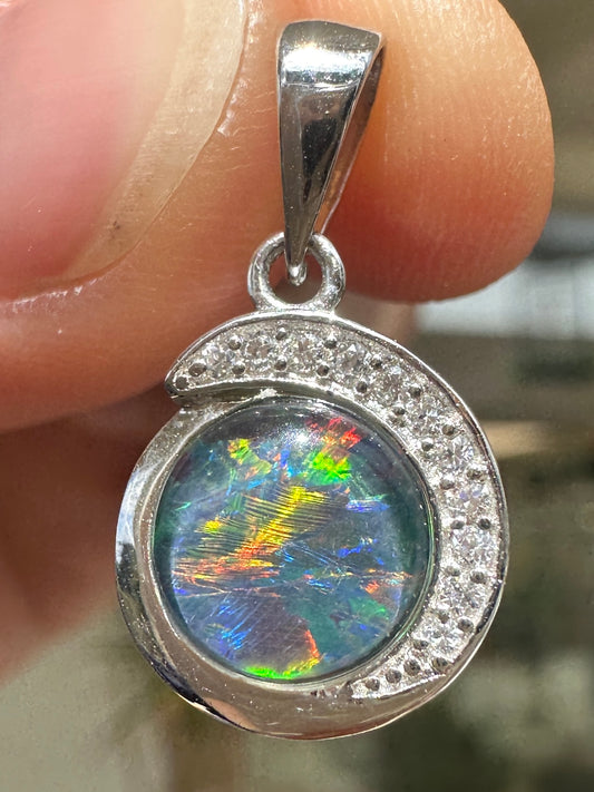 Australian muliticolored opal doublet drop pendant set in sterling silver and encrusted with cubic zirconia diamonds 7.135 cts