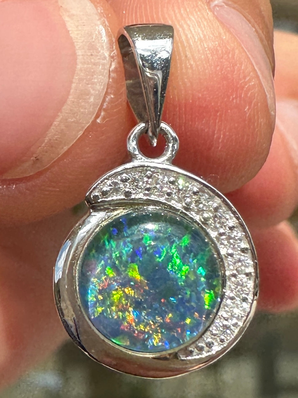 Australian muliticolored opal doublet drop pendant set in sterling silver and encrusted with cubic zirconia diamonds 7.25 cts