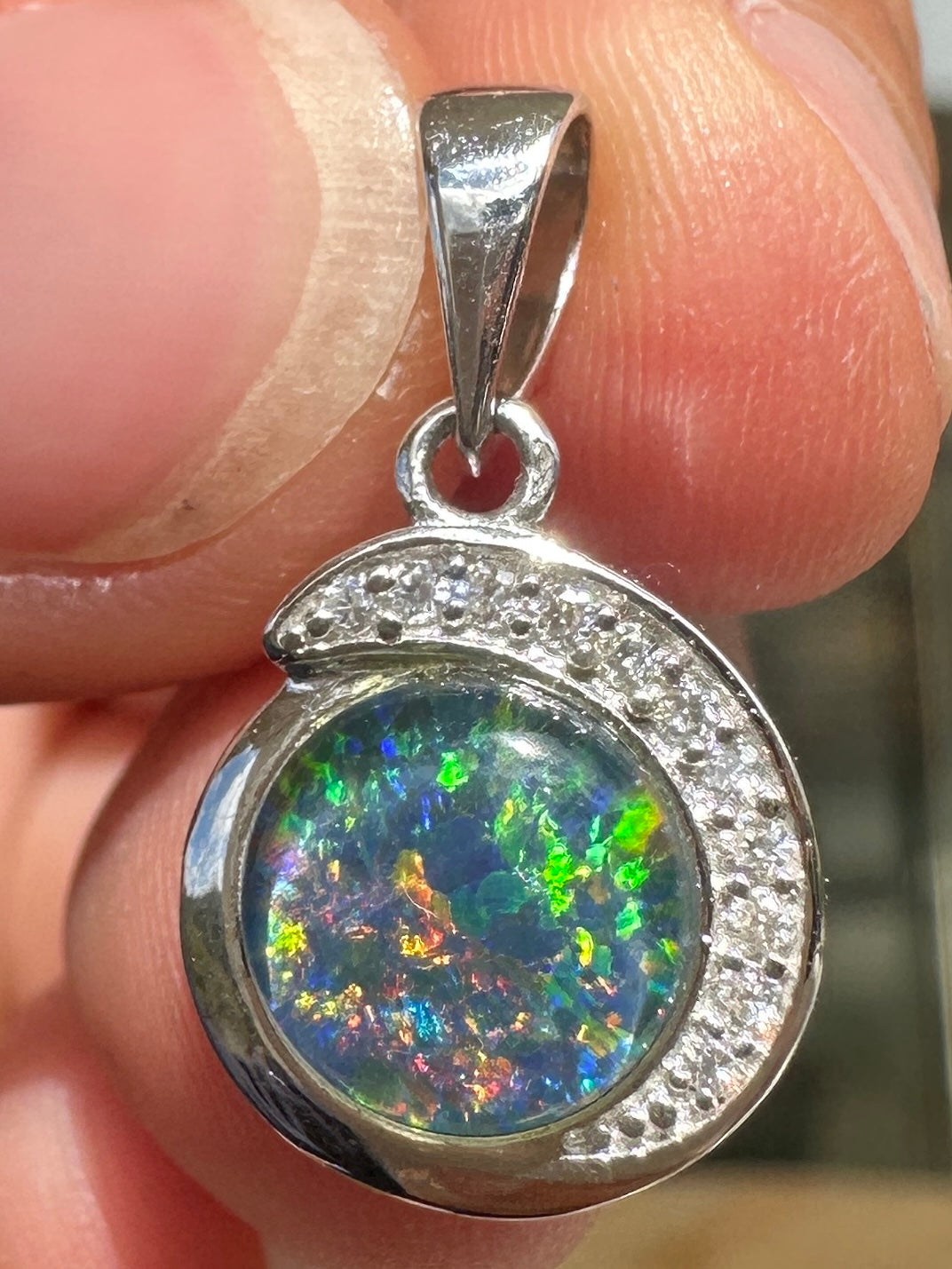 Australian muliticolored opal doublet drop pendant set in sterling silver and encrusted with cubic zirconia diamonds 7.25 cts