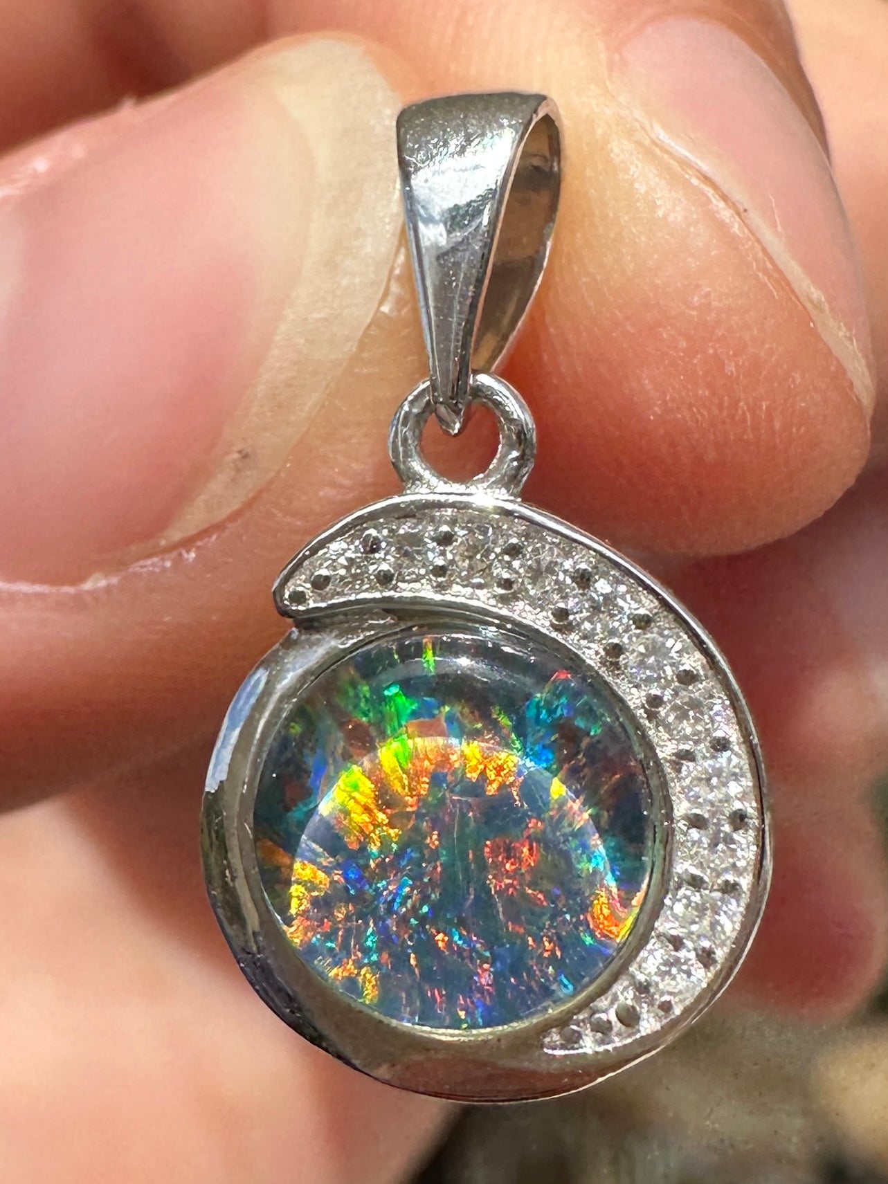 Australian muliticolored opal doublet drop pendant set in sterling silver and encrusted with cubic zirconia diamonds 6.965 cts