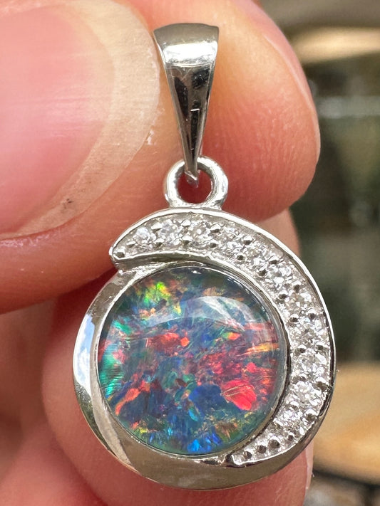 Australian muliticolored opal doublet drop pendant set in sterling silver and encrusted with cubic zirconia diamonds 7.23 cts