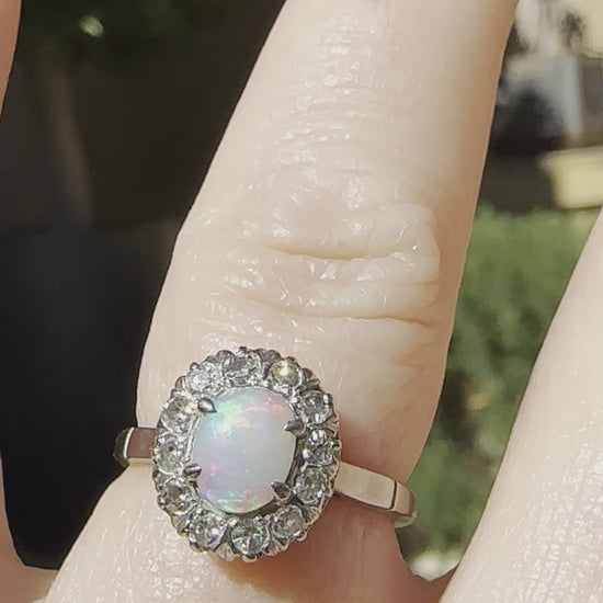 stunning opal engagement ring in white gold