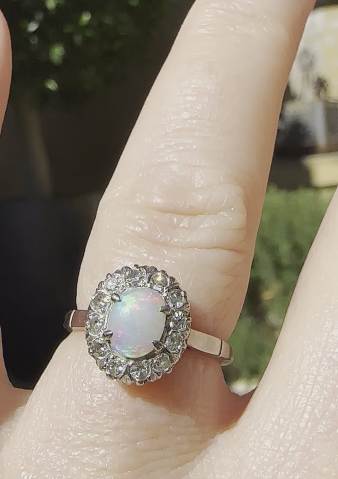 stunning opal engagement ring in white gold